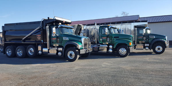 Truck Transporting Large Vehicle